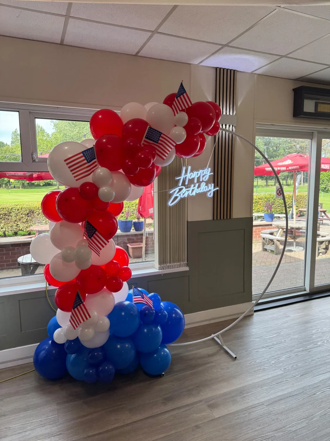 Red, white and blue birthday balloon hoop
